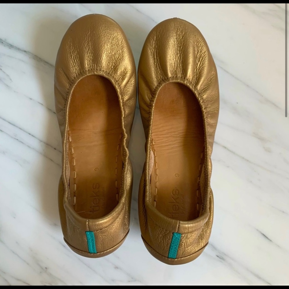 Gold tieks in gently used condition.